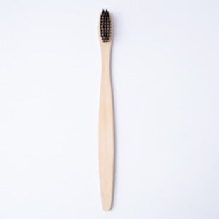 Flat bamboo charcoal soft-bristled toothbrush