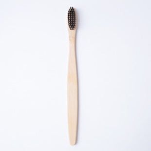 Flat bamboo charcoal soft-bristled toothbrush